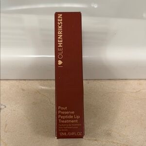 Ole Henriksen Pout Preserve Peptide Lip Treatment - Red